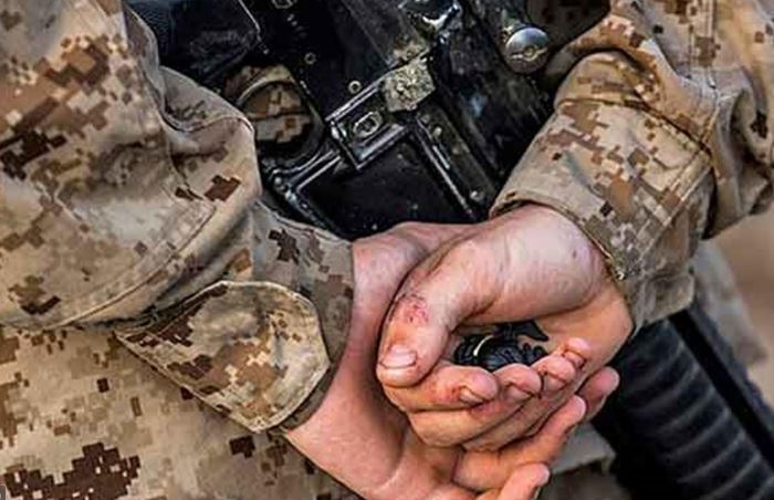 Marine arrested for alleged human smuggling after Chinese woman found in car trunk
